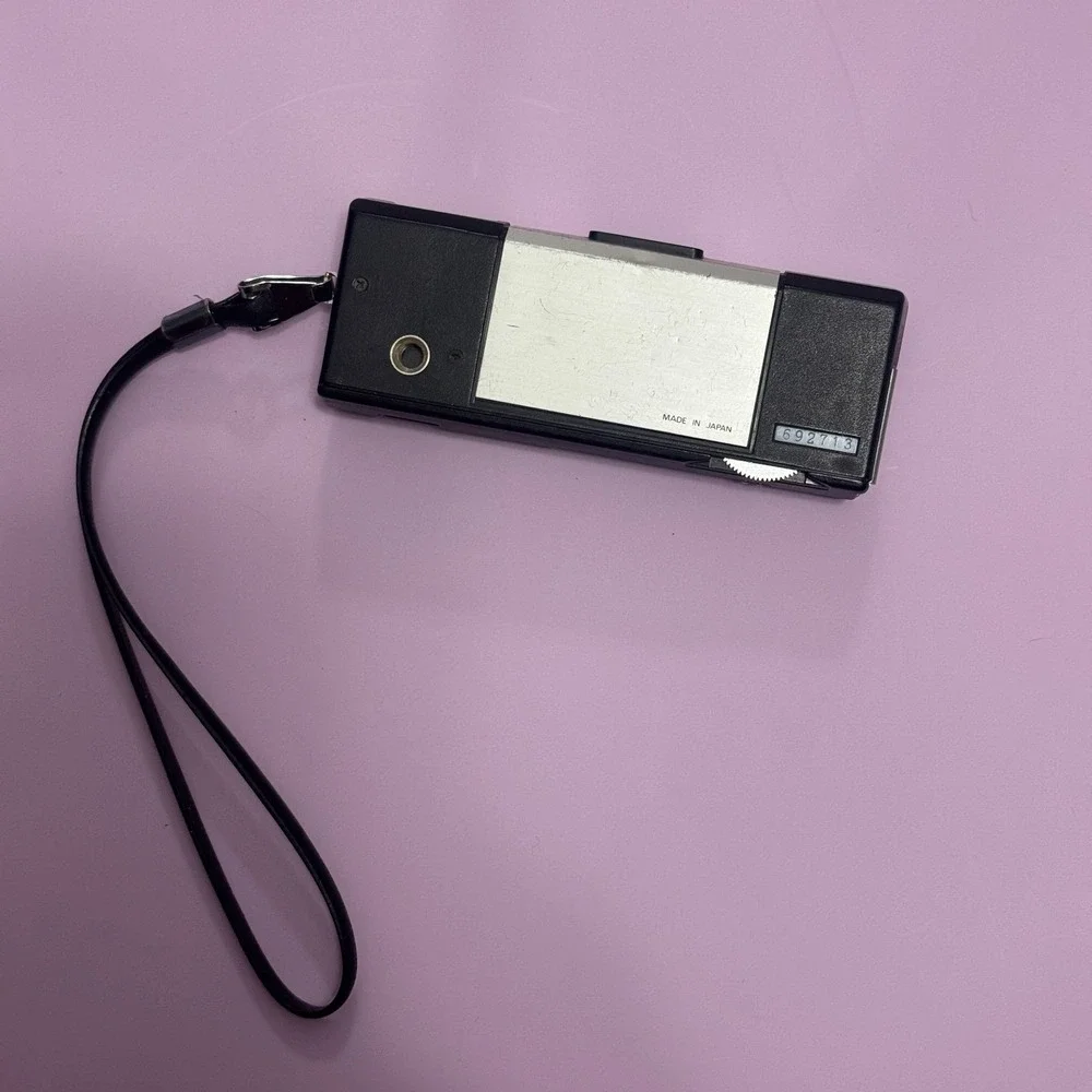 Unitron Tele 400 110 Film Camera Grip Flash Silver Black Vintage Untested